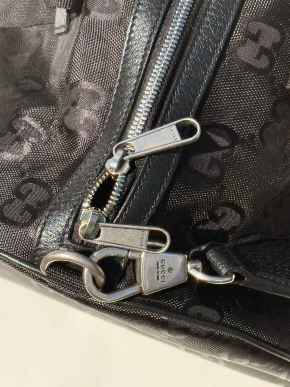 Gucci GG Canvas Duffel Bag – Black Monogram Gold Logo Travel Bag with Strap